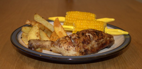 Jerk Chicken w/ homemade wedges and corn on the cob